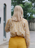 Melissa Blouse, back view, with the Mae Pant in Leo