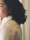 Woman's Cream Pearl Snap Shirt
