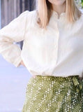 Margot Blouse in sand with the Saint Maxime Wrap Skirt in baubles print